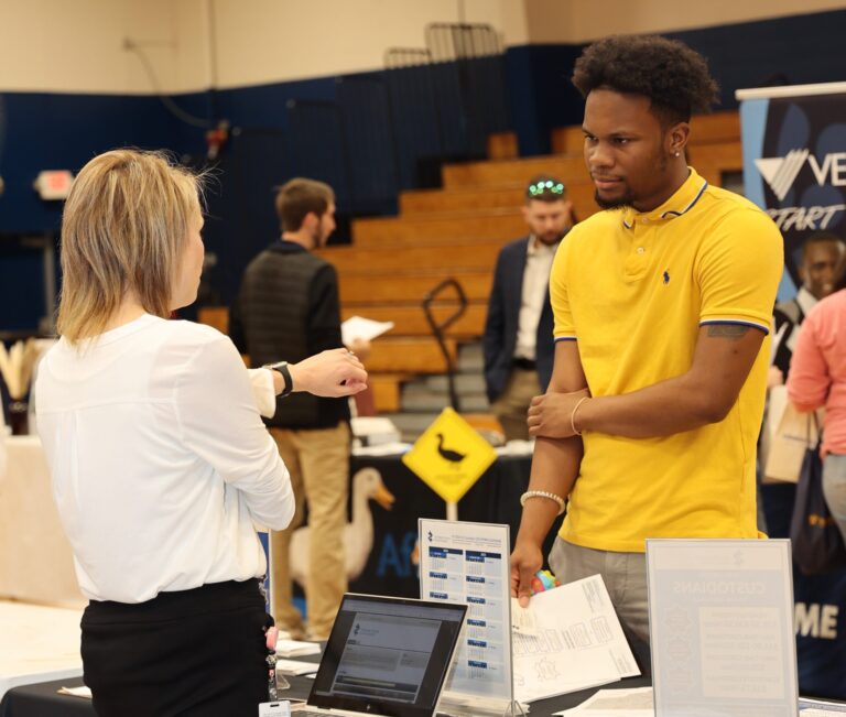 A student job-seeker meets with a recruiter