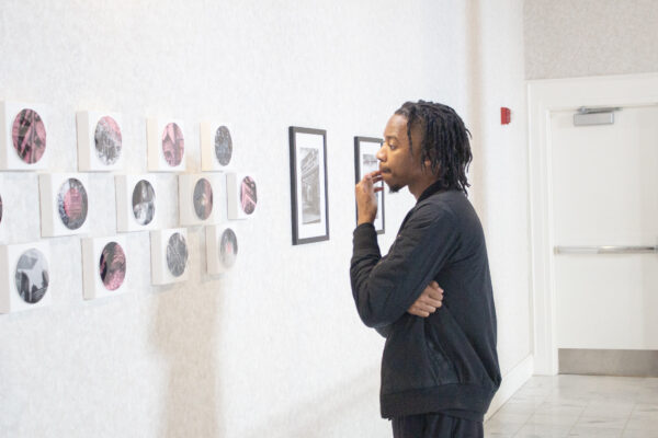 Reinhardt student looking at art in a gallery